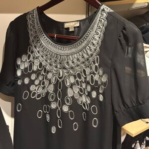 Fever brand black dress sits above knee